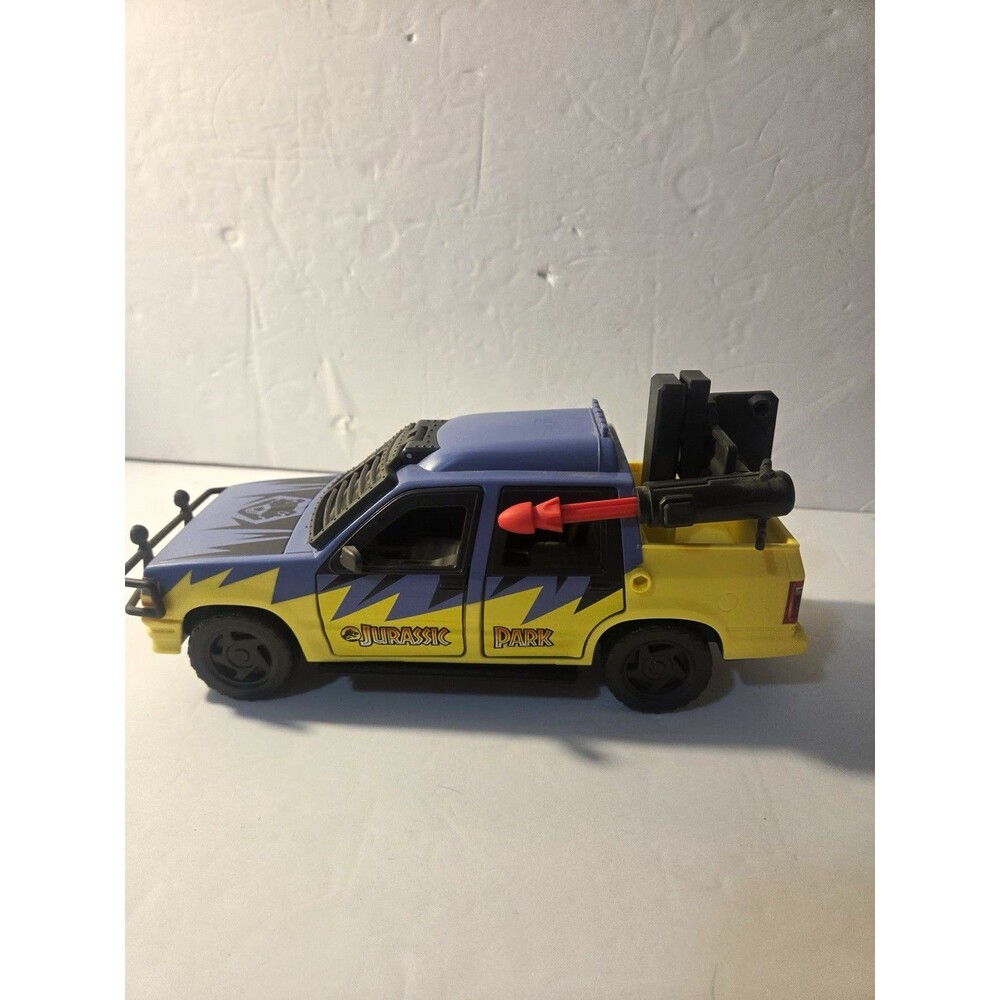 Mattel Jurassic Park 1993 Ford Explorer Truck Blue Yellow Black